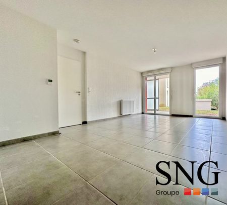 T3 AVEC TERRASSE ET PARKING - Photo 2