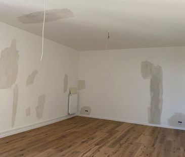 Modernisierte Altbauwohnung mit Einbauküche in der Uhlandstraße - Photo 6