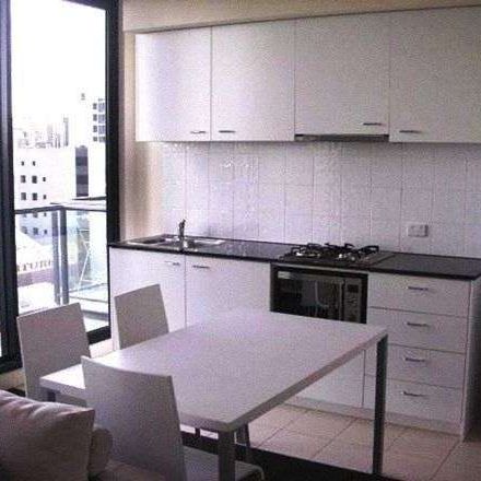 Furnished 2-Bedroom Apartment in Prime Melbourne CBD Location - Photo 1