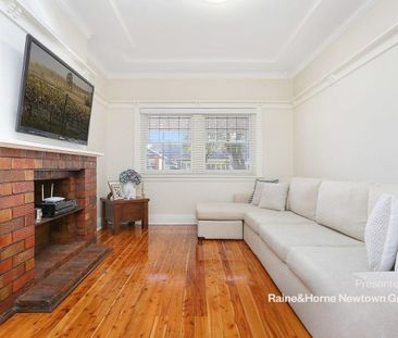 Enjoy Easy Living in This Charming 2-Bedroom Gem - Photo 1