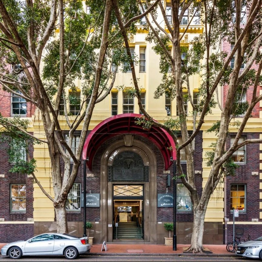 Beautifully Renovated Apartment in the Iconic Goldsbrough Building - Photo 1
