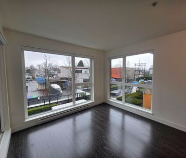 Stylish One Bedroom + Den Residence with Private Balcony - Photo 1