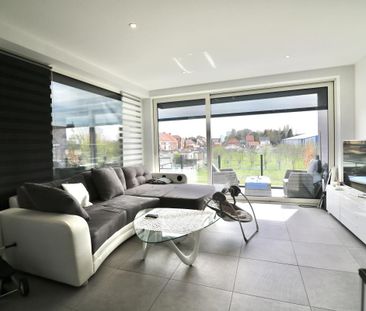 Ruim appartement met 2 slpk, garagebox, kelderberging en mooi zonne... - Photo 4