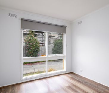 TWO BEDROOM SPACIOUS UNIT WITH DOUBLE GARAGE - Photo 1