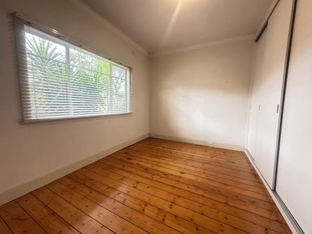 Spacious 3-Bedroom Home with Sunroom & Great Backyard - Photo 5