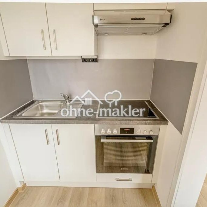 Frisch renovierte 1-Zimmer-Wohnung mit großem Balkon & neuer Einbauküche in Burghause - Foto 1