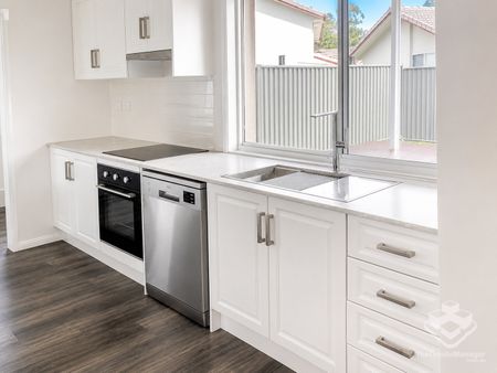 Fully Renovated Three-Bedroom Home in Peaceful Surfers Palms East - Photo 2
