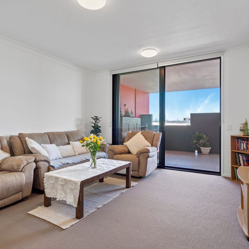 Partially Furnished Apartment in Great Location - Photo 1