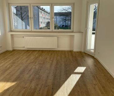 Tolle 2-Zi.-Wohnung mit Balkon und eigenem Gartenanteil in bester L... - Foto 1