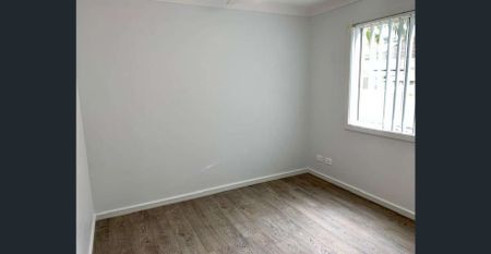 Modern & Secure Two-Bedroom Home in Prime Location - Photo 4