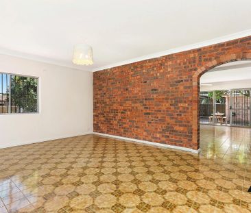 Expansive Six-Bedroom Home in Peaceful Riverside Pocket - Photo 1