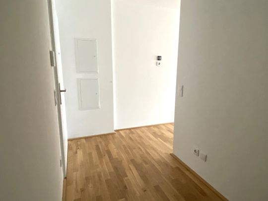 Moderne 2-Zimmer-Wohnung mit Balkon in Stammersdorfer Heurigengegend - Foto 1