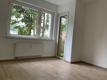 Diese Wohnung befindet sich in einem besonders grünen Wohnumfeld! - Photo 3