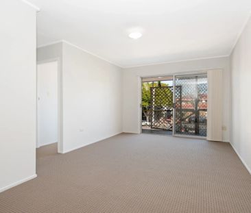 Well-Located Two-Bedroom Apartment with Carport - Photo 1