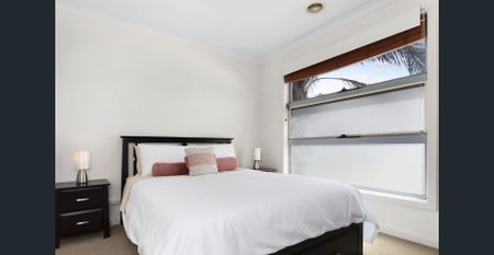 Elegant Double-Storey Townhouse Offering Modern Comfort and Low-Maintenance Living - Photo 2