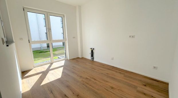 Lichtdurchflutete Erdgeschosswohnung mit Terrasse und Gartennutzung in Bestlage - Photo 1