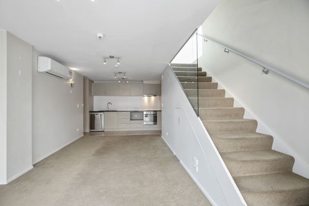 Stylish two-bedroom apartment puts you in the heart of the city - Photo 1