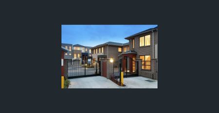 Quietly Located in a Convenient Gated Complex - Photo 2