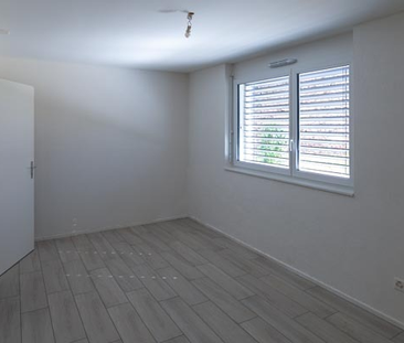 2.5 pièces au rez-de-chaussée - Photo 1