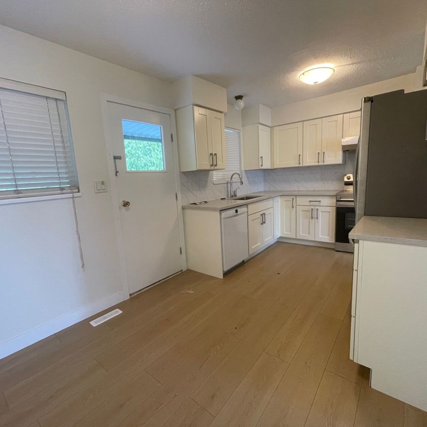 Beautifully Renovated Two-Level Home - Photo 1