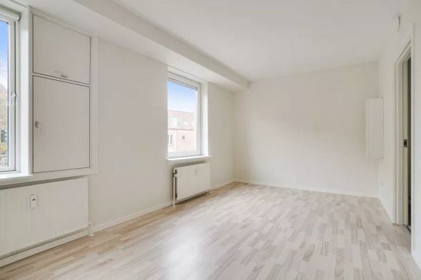 Lys og central lejlighed - Photo 1
