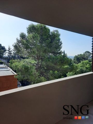 T2 AVEC LOGGIA ET DEUX PARKINGS EXTERIEURS - Photo 4