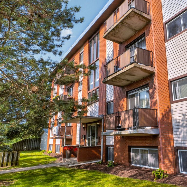 Hugo Place Apartments - PARKING SPACE, WATER & HEAT INCLUDED - Photo 1