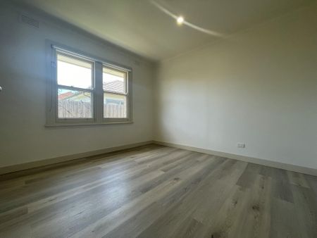 FULLY RENOVATED STYLISH TWO BEDROOM UNIT - Photo 2