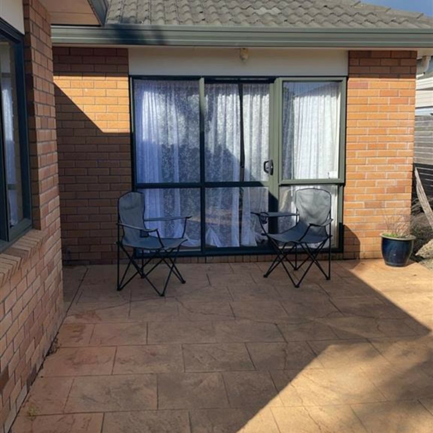 WELL PRESENTED BRICK AND TILE HOME - Photo 1