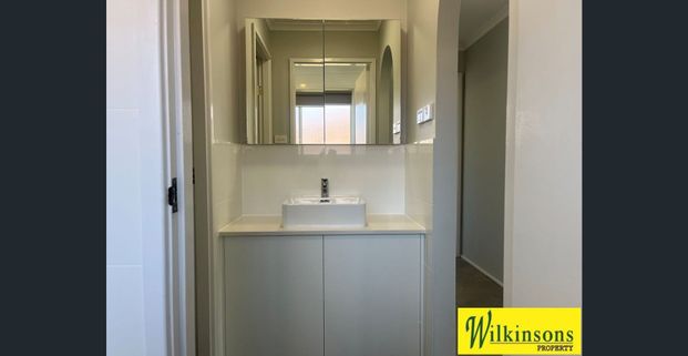 Better than New - 3 bedroom home on large block with garage - Photo 1