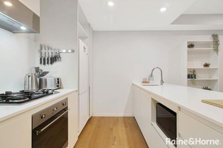 Fully Furnished, Ground-Floor Luxury with Rare Courtyard Escape - Photo 5