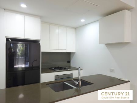 Sleek Modern Living with Unmatched Convenience - Photo 5