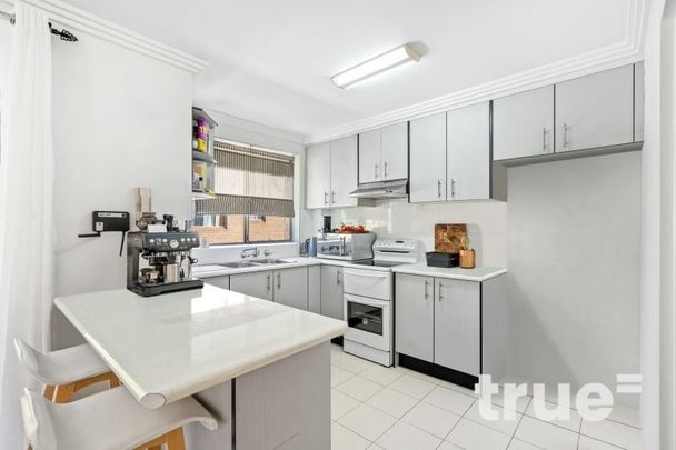 WELL APPOINTED TWO BEDROOM UNIT - Photo 1