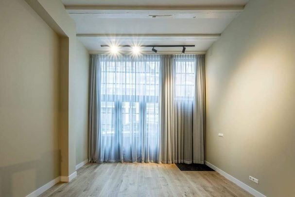 Appartement au rez-de-chaussée Bloemstraat 19-A, Amsterdam - À louer - Photo 1