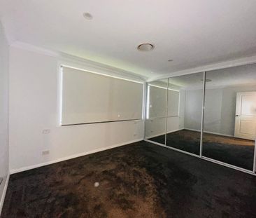 Spacious & Modern Family Home Close to Amenities - Photo 3