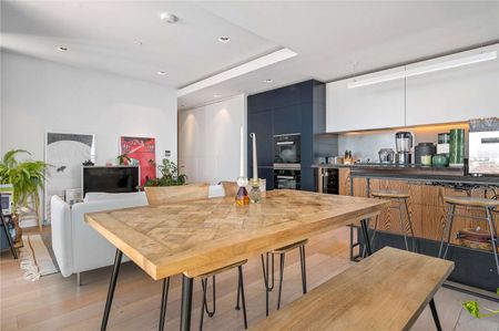 A top floor two bedroom apartment with stunning views in the Barts Square development. - Photo 5