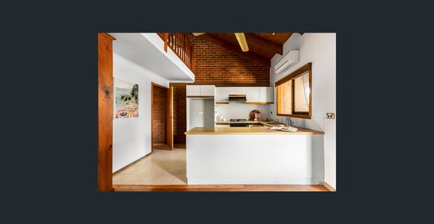 Stylish two-bedroom villa with mezzanine living - Photo 1