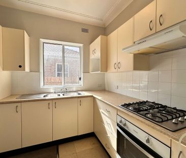 Family Comfort and Convenience in Prime Villawood Location! - Photo 1