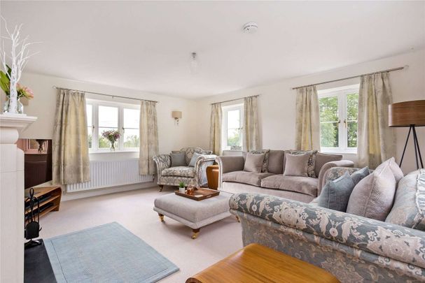 A superb high specification, energy efficient family home constructed in 2019, with wraparound garden, detached garage and wonderful views - Photo 1