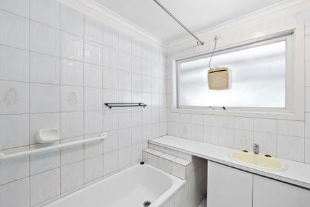 Spacious Four-Bedroom Home with Gardening Included - Photo 4