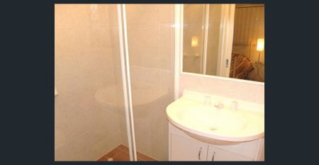 Beat the heat by the pool this summer in this 1 bedroom loft style property - Photo 4