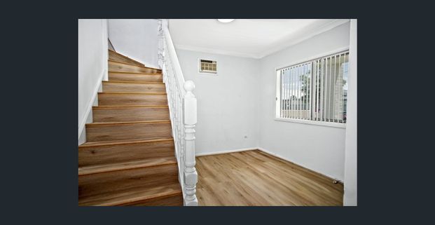 Two-Story Family Home - Photo 1