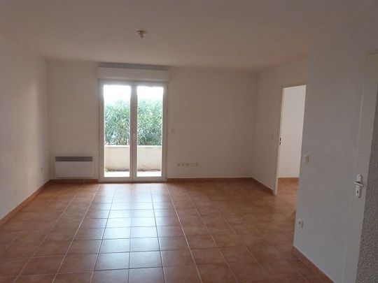 Appartement T3 RDC Avec Terrasse Jardin et Place de Parking Superficie 55 m2 - Photo 1