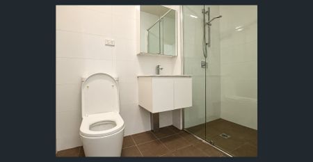 Stylish One-Bedroom Apartment with Brand-New Flooring Throughout - Photo 5
