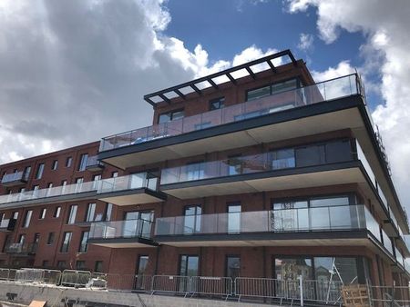 Nieuwbouwappartement met terras en parkeerplaats - Photo 2