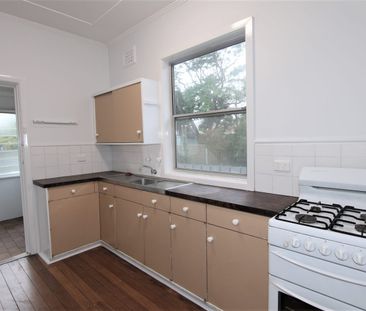 2 Bedroom Home with Sunroom, In A Great Position - Photo 2