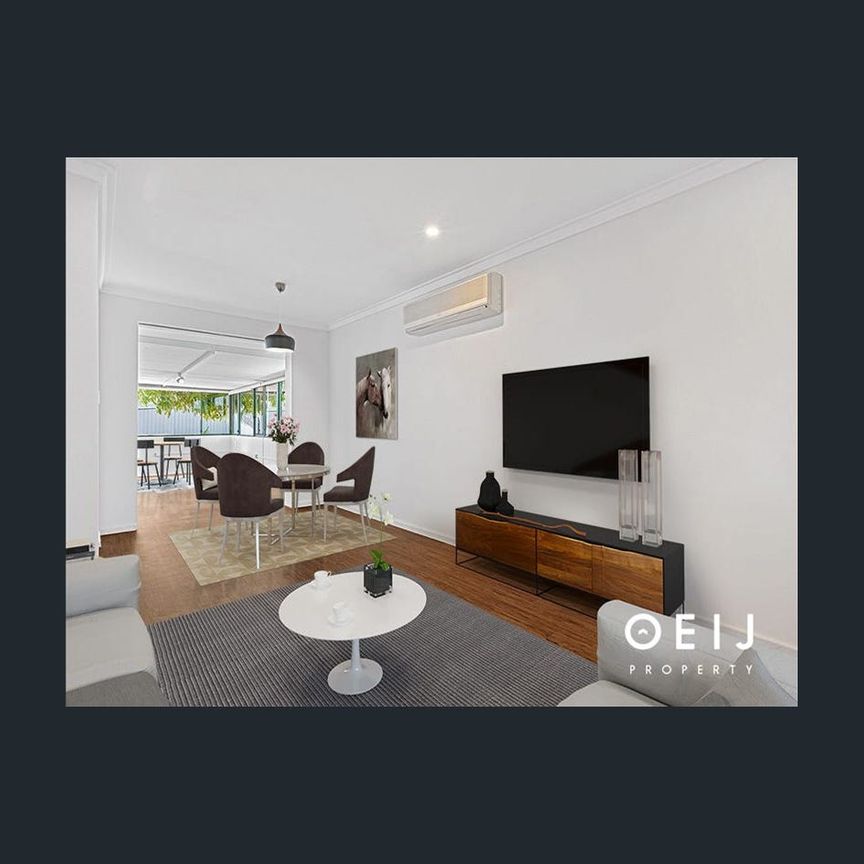 FAMILY OASIS WITH TRIPLE GARAGE & POOL! - Photo 1