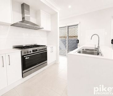 Brand New Family Home with Premium Finishes & Spacious Open Plan Li... - Photo 6