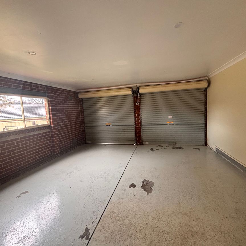 Big Family Home, No Mowing Required! - Photo 1