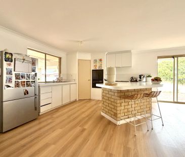 Coastal Charm - 4 Bedroom Home in Sought-After Halls Head - Photo 4